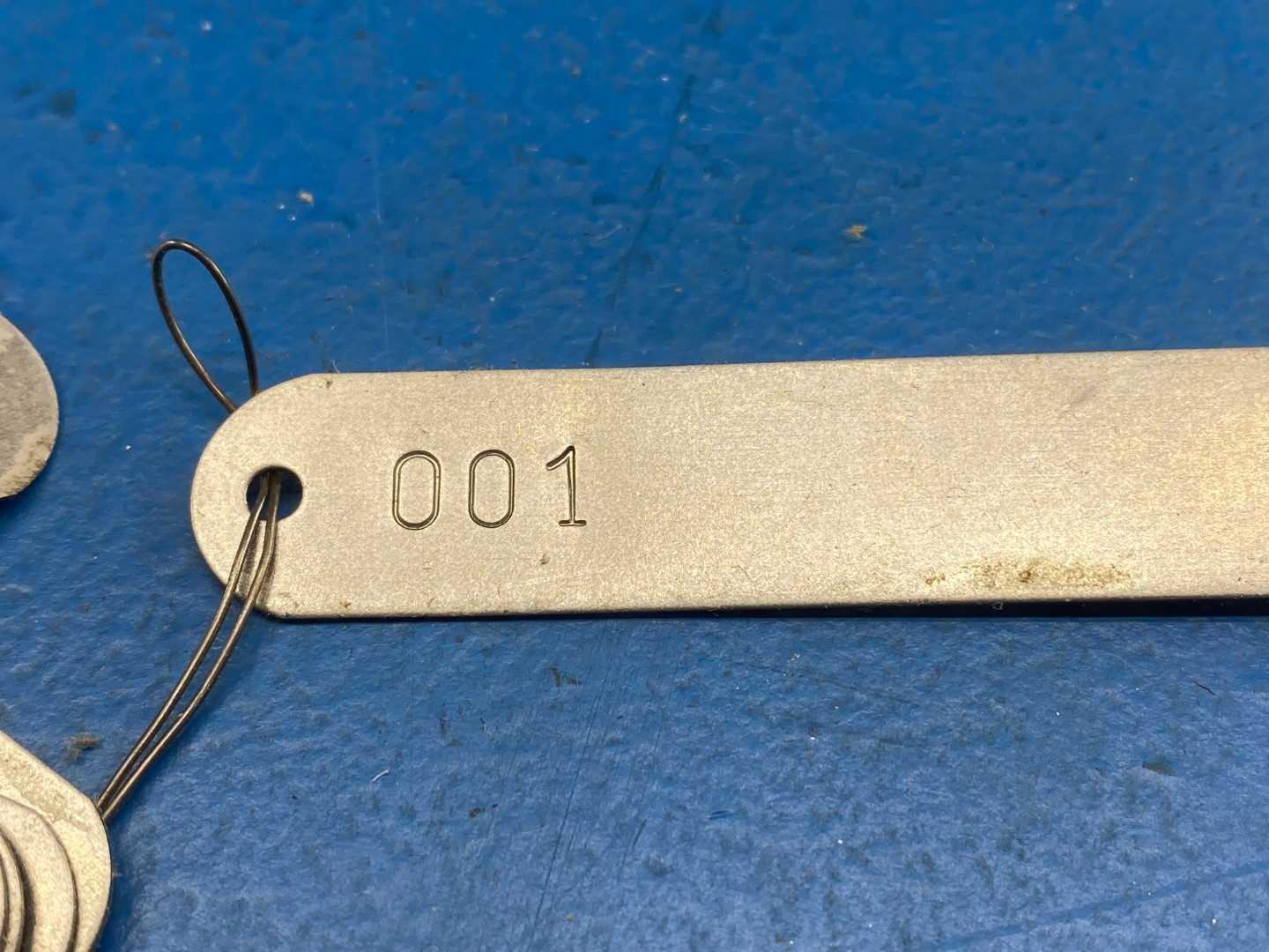 The Metal Marker MFG Co. Metal Numbered Plates from No. 001 to No. 950